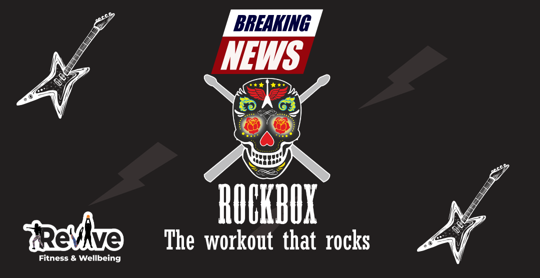 Rockbox fitness class setup with drumsticks, and rock playlist theme for women’s workout